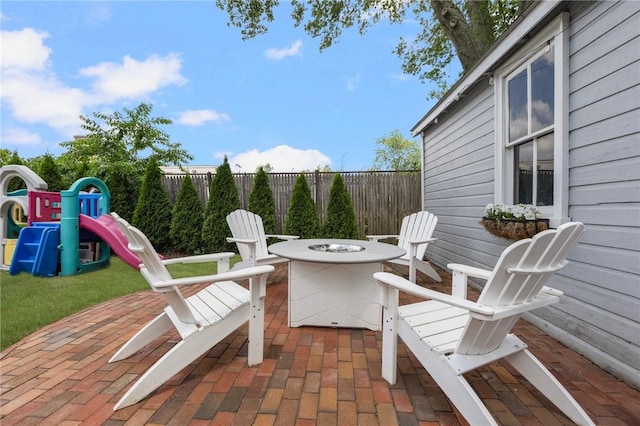 157 Arnold Ave, Cranston, RI 02905 - view of patio / terrace featuring a playground and an outdoor fire pit