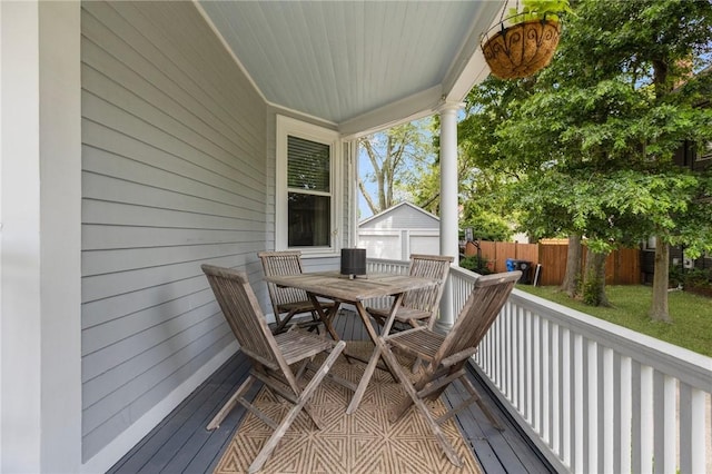 157 Arnold Ave, Cranston, RI 02905 - wooden terrace featuring outdoor dining space and an outbuilding