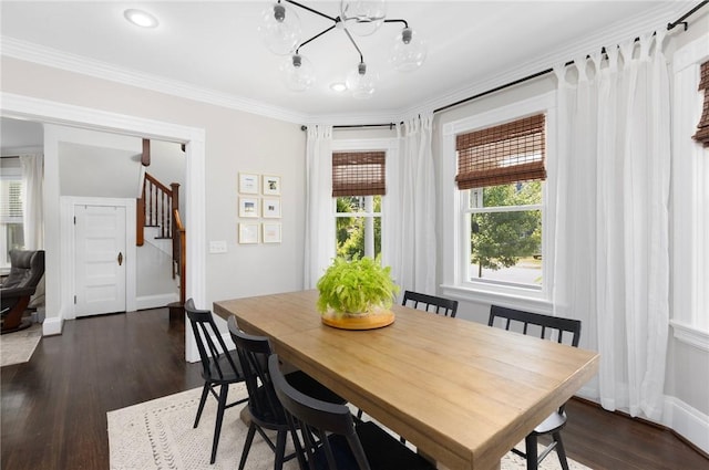 157 Arnold Ave, Cranston, RI 02905 - dining room featuring stairs, a chandelier, crown molding, dark wood-style flooring, and recessed lighting