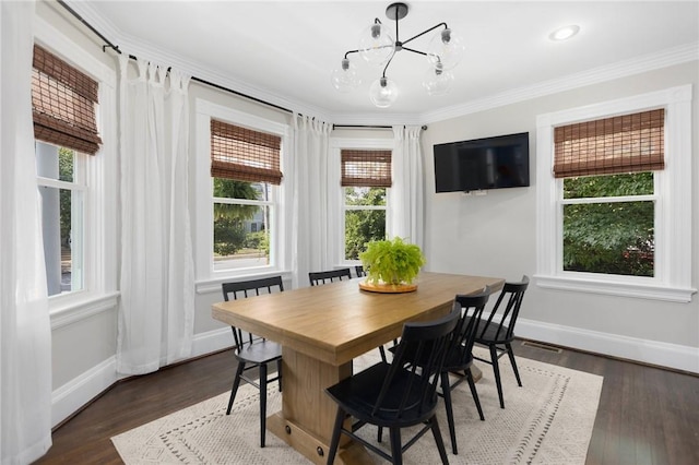 157 Arnold Ave, Cranston, RI 02905 - dining area featuring a chandelier, ornamental molding, and dark wood-style floors
