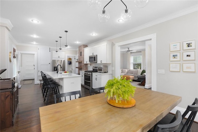 157 Arnold Ave, Cranston, RI 02905 - dining room with ornamental molding, recessed lighting, dark wood-style flooring, and ceiling fan