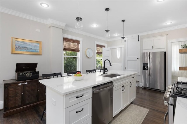 157 Arnold Ave, Cranston, RI 02905 - kitchen featuring stainless steel appliances, dark wood-type flooring, a kitchen island with sink, white cabinets, and crown molding