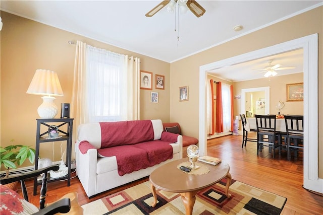 10 Walnut St, East Providence, RI 02914 - living room with ceiling fan, wood finished floors, and ornamental molding