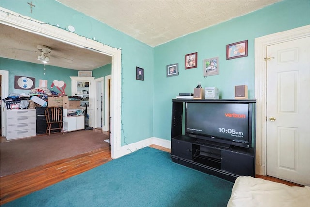 10 Walnut St, East Providence, RI 02914 - living room with wood finished floors, a ceiling fan, and an office area