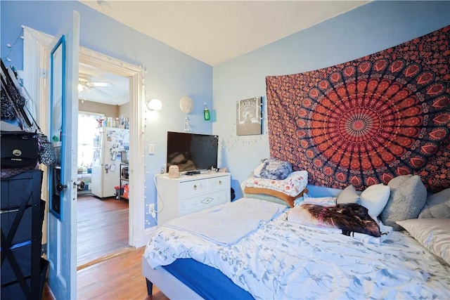 10 Walnut St, East Providence, RI 02914 - bedroom featuring wood finished floors and freestanding refrigerator
