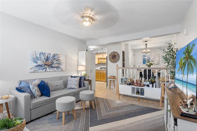 132 Hoffman Ave Unit 116, Cranston, RI 02920 - living room with light tile patterned floors and a dry bar