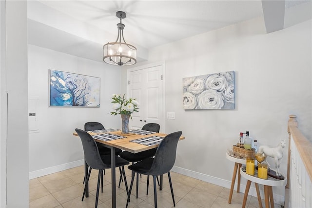 132 Hoffman Ave Unit 116, Cranston, RI 02920 - dining area with a chandelier and light tile patterned flooring