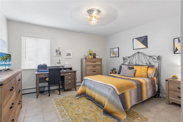 132 Hoffman Ave Unit 116, Cranston, RI 02920 - bedroom featuring light tile patterned floors, a desk, and a baseboard radiator