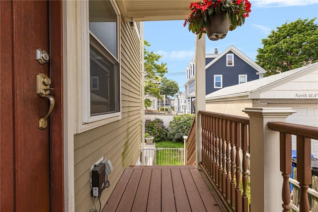 13 Vaughan Ave, Newport, RI 02840 - wooden porch with a residential view