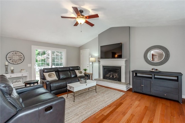 11 Greenbrier Rd, Smithfield, RI 02828 - living room with a ceiling fan, a glass covered fireplace, light wood finished floors, and lofted ceiling