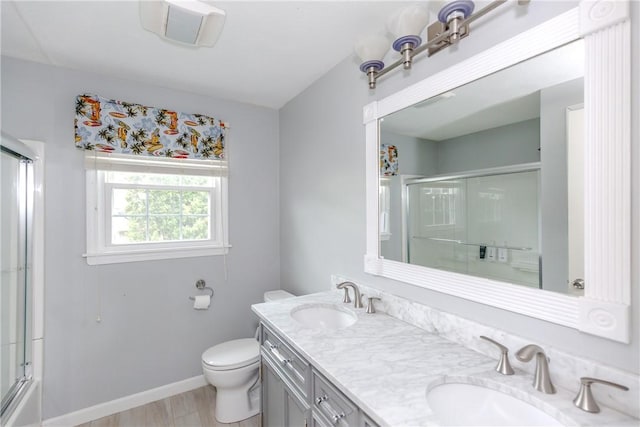 11 Greenbrier Rd, Smithfield, RI 02828 - full bath featuring double vanity and wood finished floors