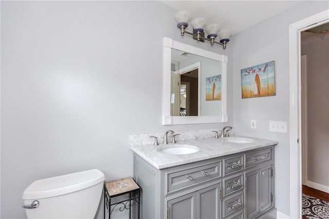 11 Greenbrier Rd, Smithfield, RI 02828 - bathroom with double vanity and toilet