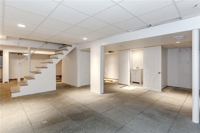 11 Greenbrier Rd, Smithfield, RI 02828 - finished basement featuring stairway, a paneled ceiling, and recessed lighting