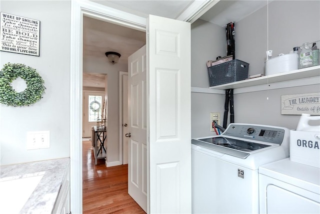 11 Greenbrier Rd, Smithfield, RI 02828 - laundry room with separate washer and dryer and light wood-style floors