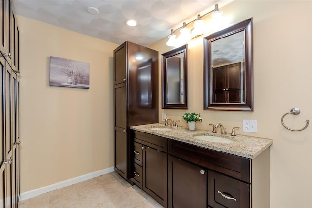 11 Greenbrier Rd, Smithfield, RI 02828 - bathroom featuring double vanity and recessed lighting