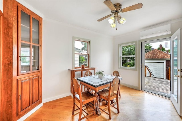 37 Denver Ave, Cranston, RI 02905 - dining room featuring a wall mounted AC, plenty of natural light, light wood-type flooring, and crown molding