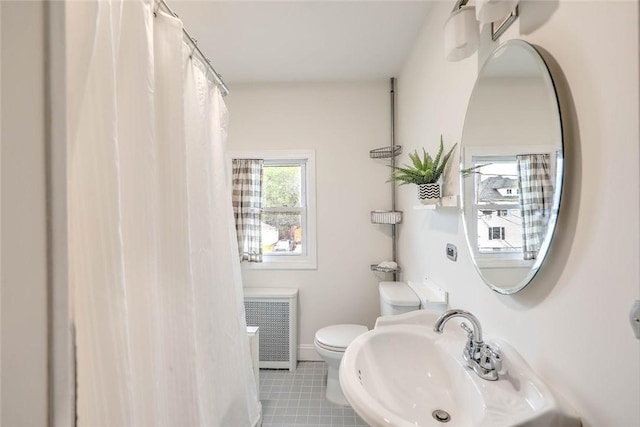 37 Denver Ave, Cranston, RI 02905 - full bathroom with radiator, tile patterned floors, and curtained shower