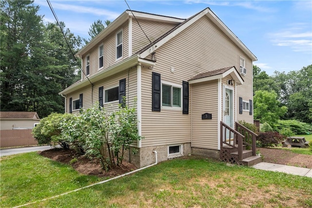 5 Harding St, Coventry, RI 02816 - view of home's exterior with entry steps and a yard