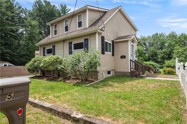 5 Harding St, Coventry, RI 02816 - view of home's exterior featuring entry steps and a shingled roof
