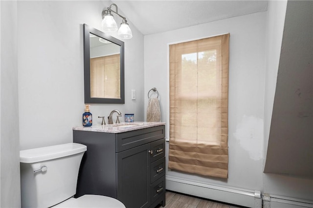 5 Harding St, Coventry, RI 02816 - bathroom featuring a baseboard radiator, vanity, and wood finished floors