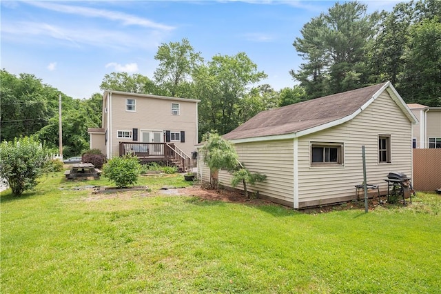 5 Harding St, Coventry, RI 02816 - rear view of property with a wooden deck and a yard