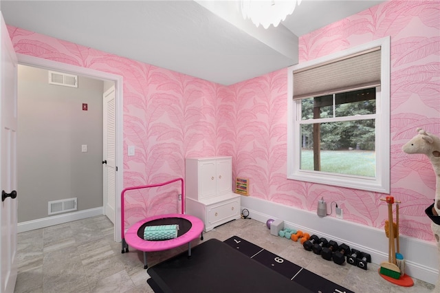 5 Jupiter Ln Unit F, Richmond, RI 02898 - living area featuring wallpapered walls and baseboards