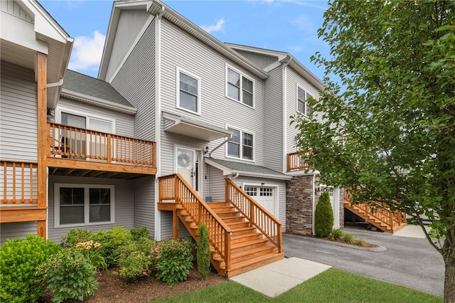 5 Jupiter Ln Unit F, Richmond, RI 02898 - multi unit property featuring stairs, asphalt driveway, and an attached garage