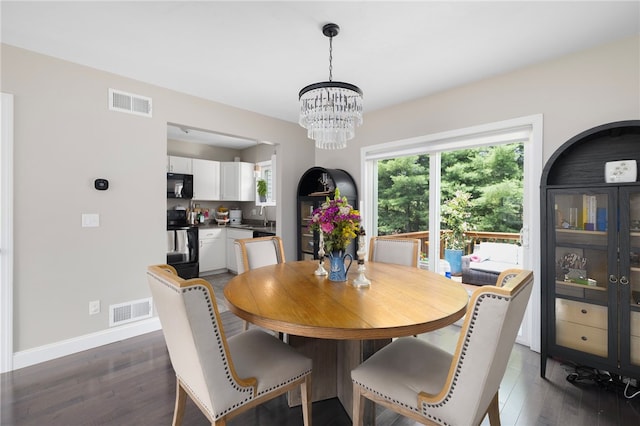 5 Jupiter Ln Unit F, Richmond, RI 02898 - dining space with a chandelier and dark wood-style floors