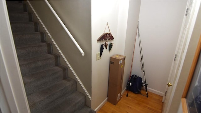 151 Hadde Ave, Cumberland, RI 02864 - stairs with wood finished floors and baseboards