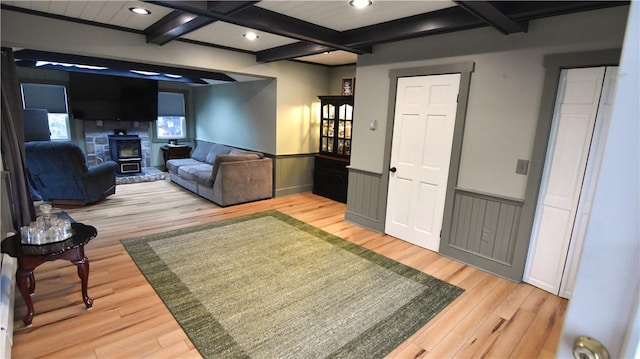 151 Hadde Ave, Cumberland, RI 02864 - living room with coffered ceiling, beamed ceiling, a wainscoted wall, light wood-style flooring, and recessed lighting
