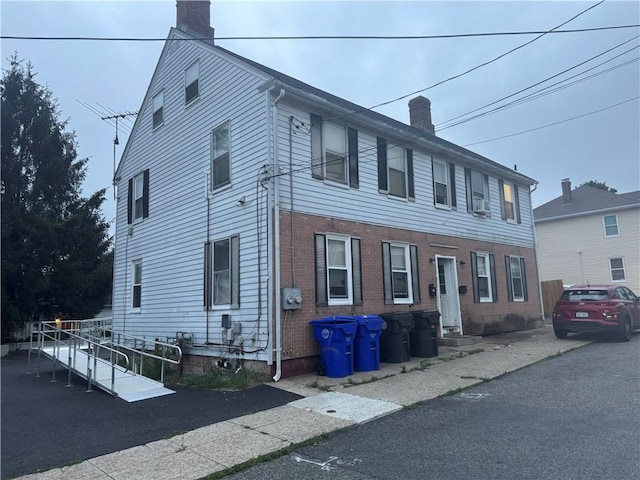 1 Penta St, West Warwick, RI 02893 - view of front of property featuring a chimney