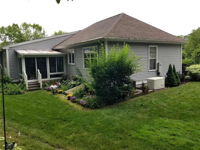 170 Providence Pike Unit 52, North Smithfield, RI 02896 - rear view of house with a shingled roof, a yard, and a sunroom