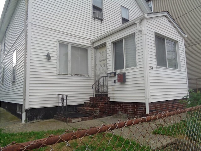 269 Althea St, Providence, RI 02907 - view of property exterior with entry steps and cooling unit