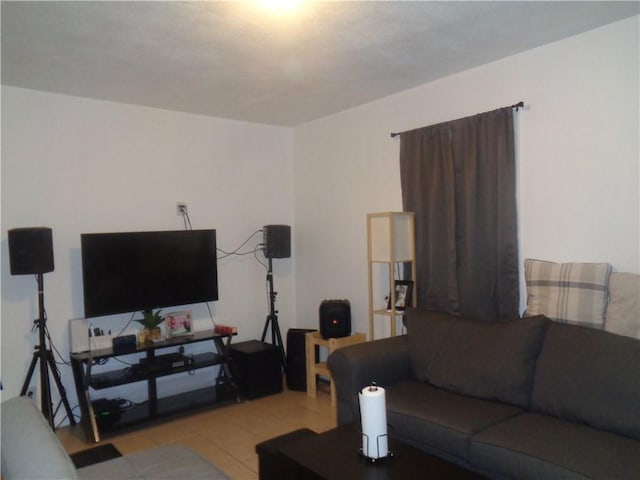 269 Althea St, Providence, RI 02907 - living room with light tile patterned flooring