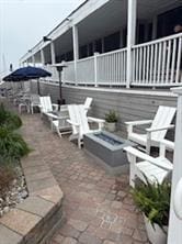 175 Bonnet Point Rd Unit V14, Narragansett, RI 02879 - view of patio / terrace featuring a fire pit