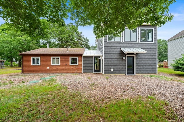 40 Alder Rd, Charlestown, RI 02813 - back of house featuring a standing seam roof and a metal roof