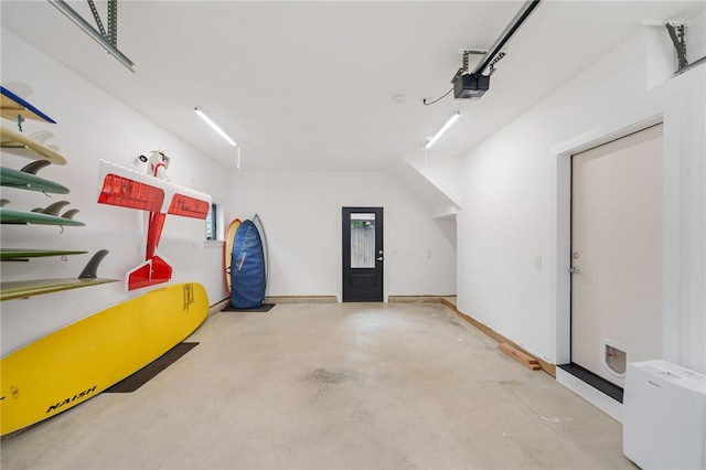 40 Alder Rd, Charlestown, RI 02813 - garage featuring a garage door opener