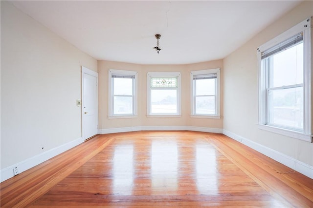 162 Rand St, Central Falls, RI 02863 - empty room with light wood finished floors and baseboards
