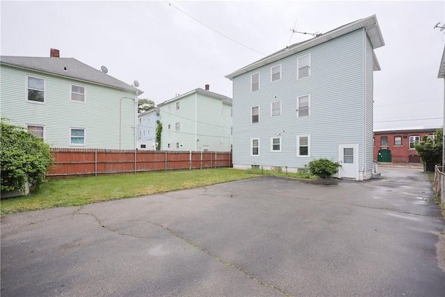 162 Rand St, Central Falls, RI 02863 - back of property featuring a patio area