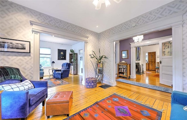 179 Elmgrove Ave, Providence, RI 02906 - living room featuring wallpapered walls, wood-type flooring, and ceiling fan