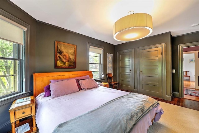 179 Elmgrove Ave, Providence, RI 02906 - bedroom with baseboards and wood finished floors