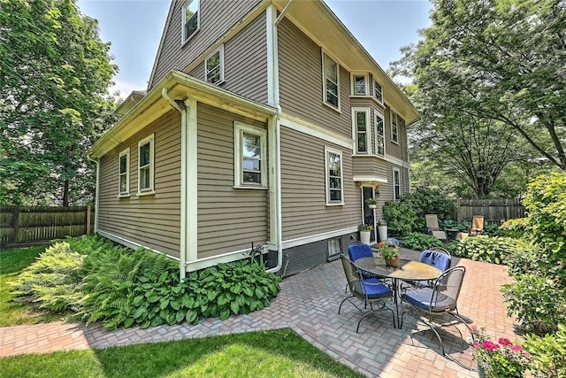 179 Elmgrove Ave, Providence, RI 02906 - back of house with a patio area