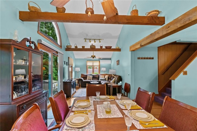 13 Welcome Rd, Smithfield, RI 02917 - dining room featuring wood finished floors, ceiling fan, beamed ceiling, high vaulted ceiling, and stairway