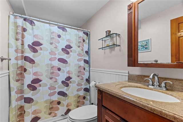 13 Welcome Rd, Smithfield, RI 02917 - bathroom with vanity, a wainscoted wall, and a shower with shower curtain