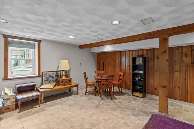 13 Welcome Rd, Smithfield, RI 02917 - dining room featuring beam ceiling, recessed lighting, and wood walls