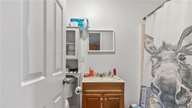 65 River St, West Warwick, RI 02893 - full bathroom featuring vanity and a shower with curtain