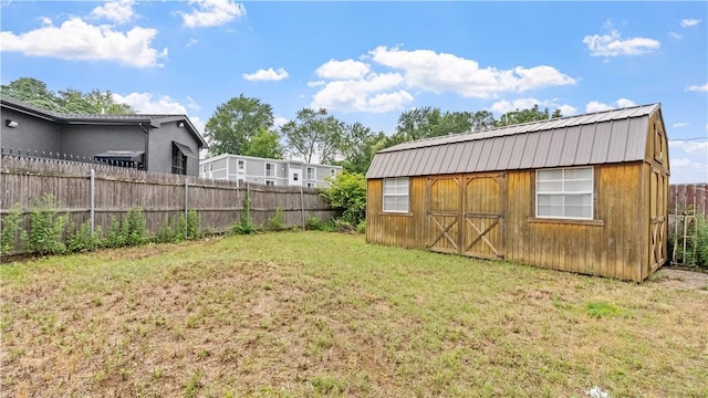65 River St, West Warwick, RI 02893 - fenced backyard featuring an outbuilding