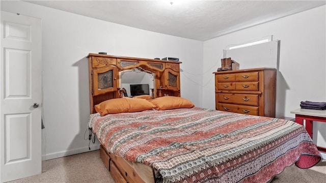 65 River St, West Warwick, RI 02893 - bedroom with dark speckled floor and baseboards