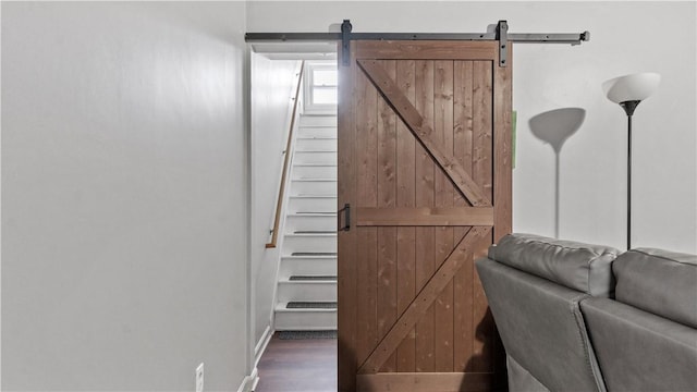 65 River St, West Warwick, RI 02893 - detailed view of a barn door and wood finished floors