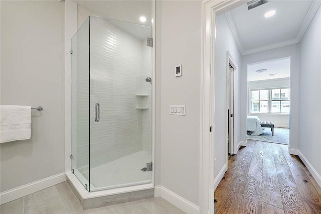 20 Kettle Point Ave, East Providence, RI 02914 - full bathroom featuring crown molding, a shower stall, and wood finished floors